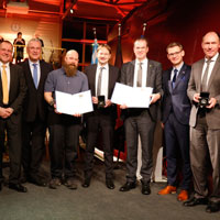 Verkehrsminister Hans Reichhart, Innenminister Joachim Herrmann, Amtschef Helmut Schütz und Oliver Götze, Leiter des DB Museums Nürnberg mit den Preisträgern der 'Adler-Medaille' 2018